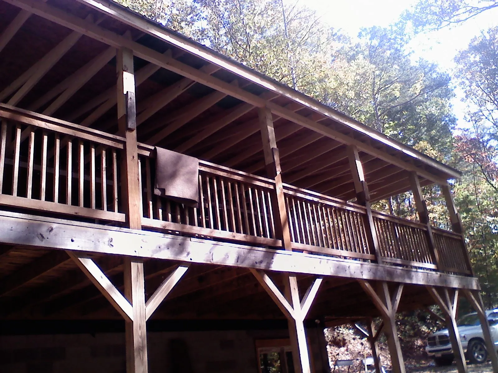 Timber framing under a new elevated porch and deck — Roof Leak Repair in Hanceville by Roofing Brothers